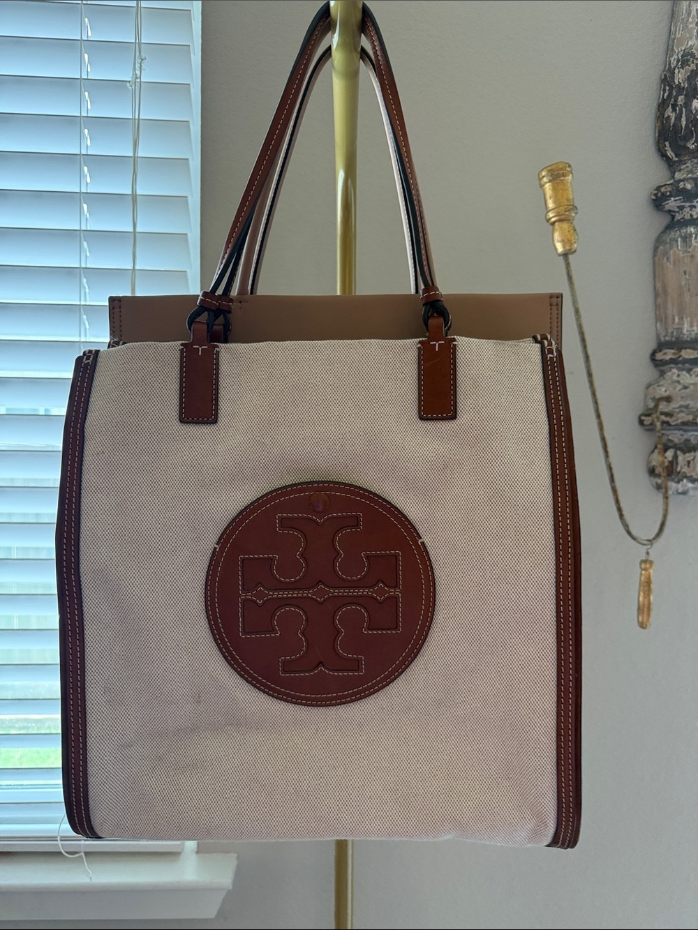 Tory Burch canvas Tote with Brown Leather Trote good condition. Looks great!